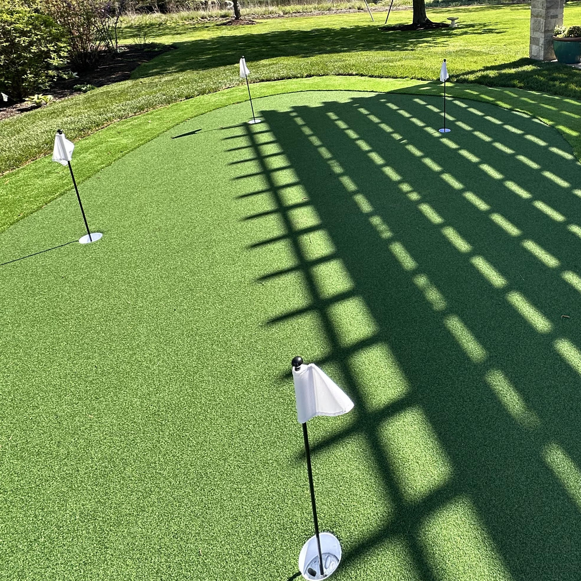 Signature Turf Putting Greens — professional installation by The Home Club